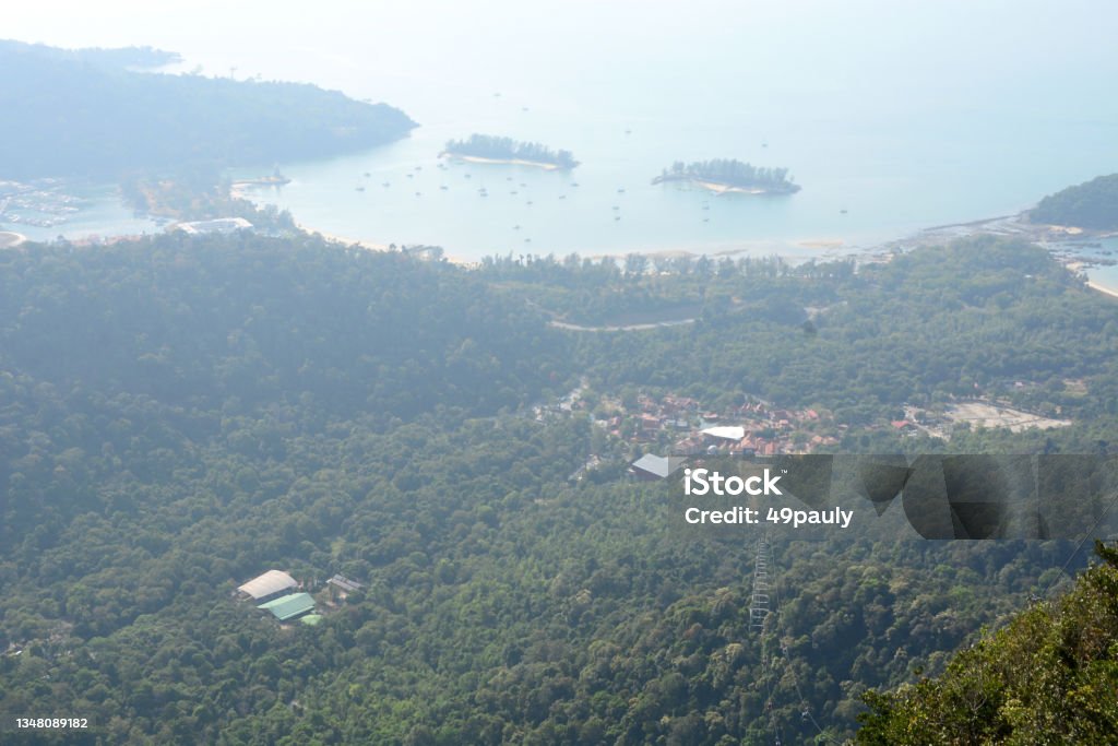 Tree canopy and Andaman sea. pulau langkawi: landscape view over the tree canopy. In the background archipelago with the Andaman sea. Archipelago Stock Photo