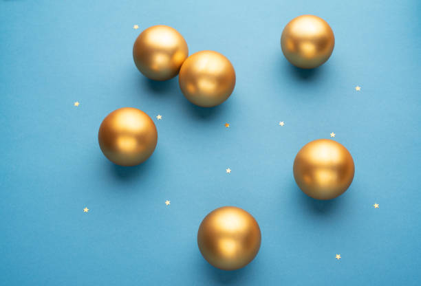 istock Christmas balls on a blue background with stars 1348089766