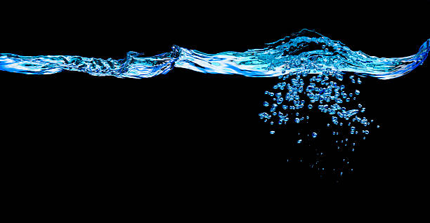 Bubbles in blue water XXL Blue wave and bubbles on black background water on black surface stock pictures, royalty-free photos & images