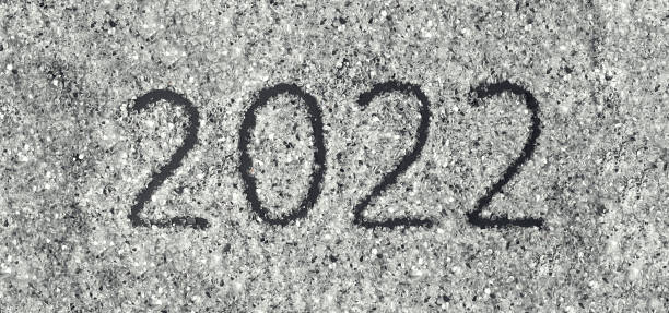 istock Number 2022 written on a scattered glitter 1348091981