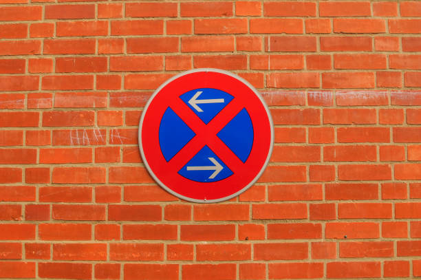 istock Brick facade with no parking sign 1348093436