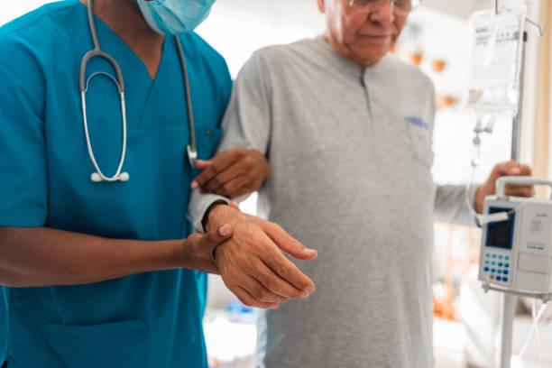 istock Health visitor and a  man during home visit 1348093693