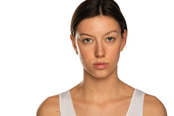 istock Beautiful young serious woman without makeup 1348094421