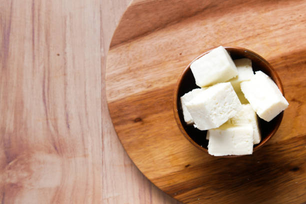 istock close up of fresh cheese in a bowl on table 1348094704