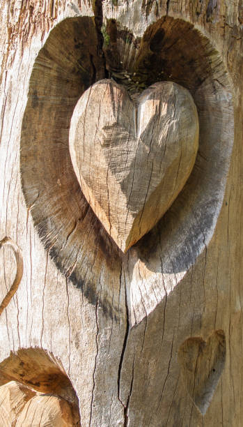 istock Heart carved in wood 1348095823