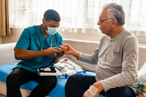 istock District male nurse at home visit 1348096230