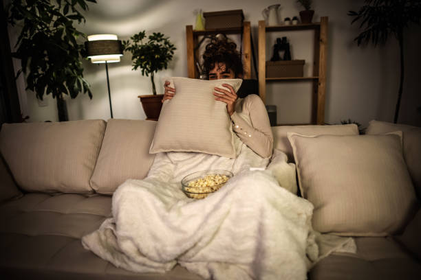 Watching a scary movie at night