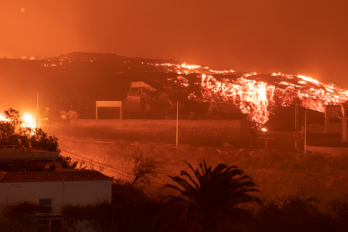 Lava flow destroying a Industrial District, La Palma volcanic Eruption. Tajuya.
