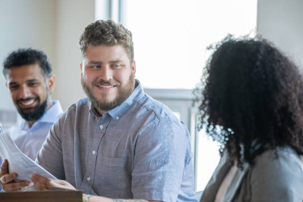 istock Young Man in a Business Meeting 1348104176