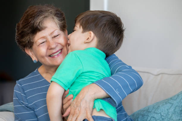 istock Grandmother hugging grandchild 1348106126