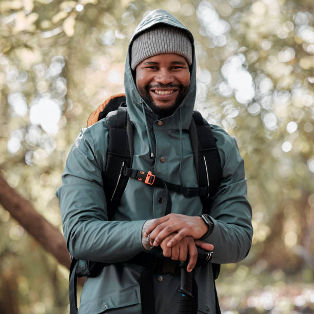 istock Shot of a man wearing a windbreaker while out on a hike 1348107206