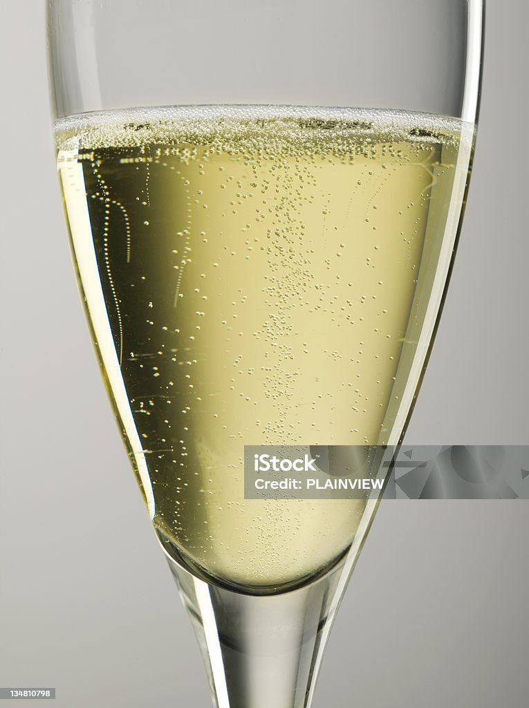 Bubbles of Champagne A closeup of Champagne flute with bubbles  Champagne Stock Photo