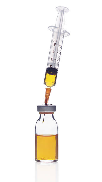 アンプルと注射器 - drop of insulin ストックフォトと画像