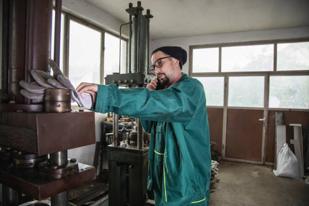 istock Metal industry worker finishing his work 1348109669