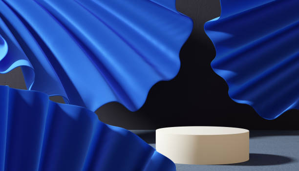 istock Blue cloth background and round podium 3d rendering for product display, object placement mockup, empty place for product presentation. 1348110150