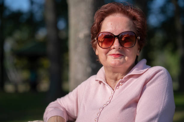Portrait of senior woman with sunglasses.