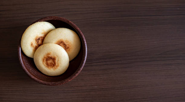 istock Venezuelan arepas on a bowl on a wooden background 1348112245