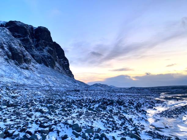 istock Sunrise outside crystal ice cave, Iceland 1348113725