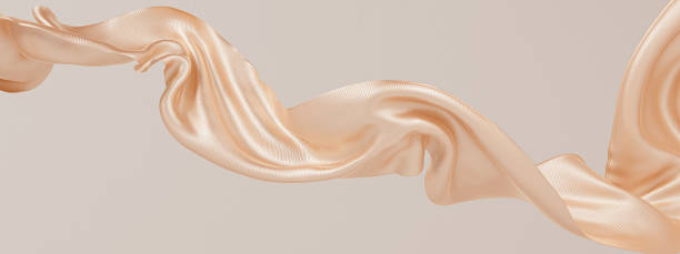 istock Golden satin cloth design element, isolated piece of blowing fabric wave, elegant textiles 3d rendering 1348116001
