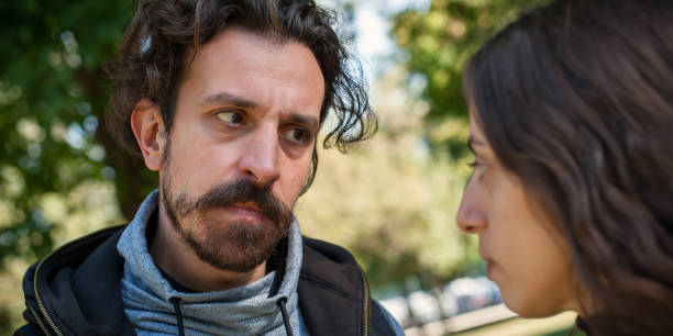 istock Jealous bully abuser abuses his girl girlfriend. Domestic violence concept 1348118063