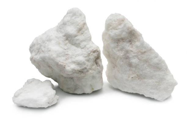 Three pieces of gypsum ore. On white background isolated Three pieces of gypsum ore. Alabaster. On white background isolated calcite stock pictures, royalty-free photos & images
