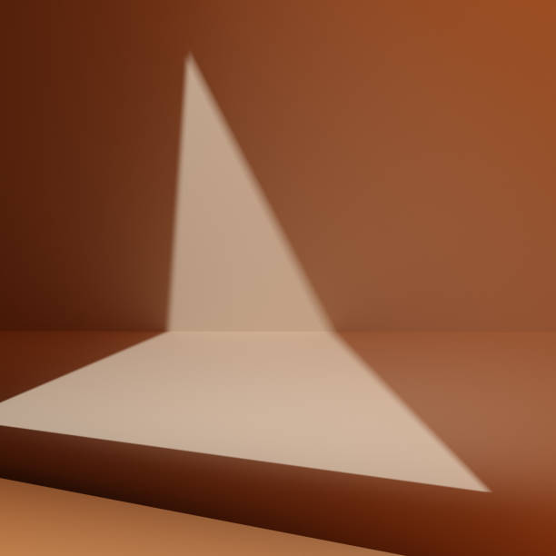 istock Minimalistic triangle shaped light in shadow on room wall, beige background for product presentation 3d rendering 1348123562