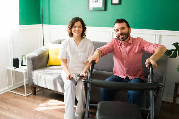 istock Injured man hiring a nurse for help 1348123970
