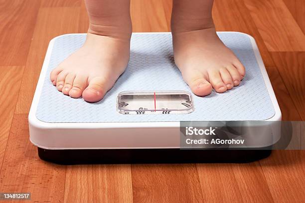 Scales Stock Photo - Download Image Now - Child, Weight Scale, Mass - Unit of Measurement