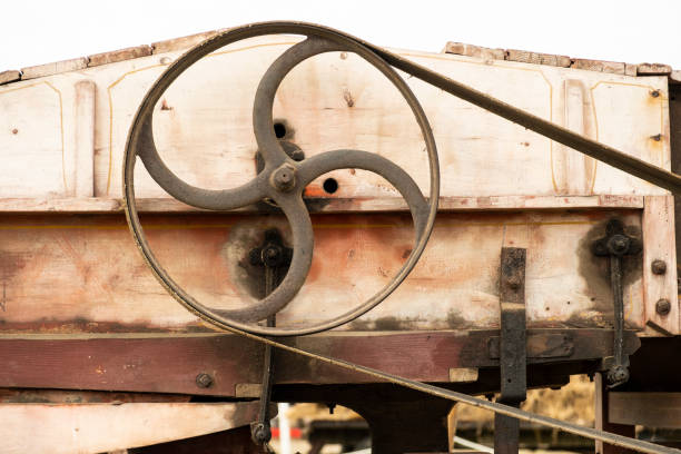 Old vintage agricultural Threshing Machine for harvesting wheat.