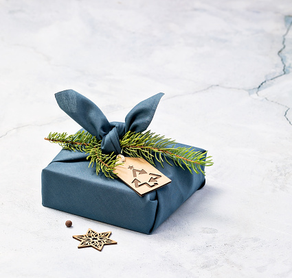 Blue Furoshiki Style Cloth Wrapped present for a Zero Waste Christmas gift.