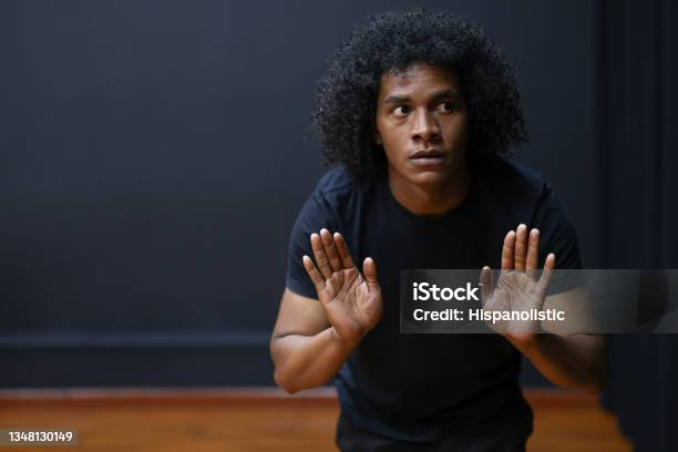 African American Drama Student Improvising In An Acting Class Stock Photo - Download Image Now