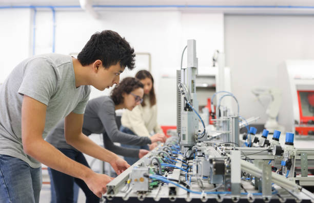 istock Group of students in a robotics class at the university 1348130870