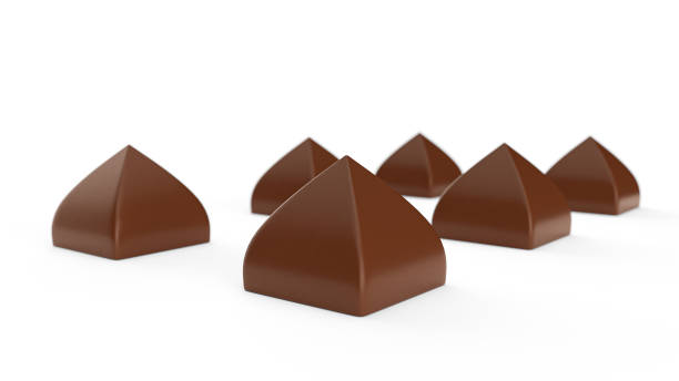 pyramidenförmige schokoladenbonbons auf weißem hintergrund. exklusive geformte bonbons 3d-illustration - pyramid shaped stock-fotos und bilder