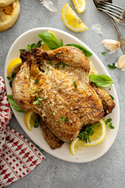 istock Whole lemon herbs and garlic roasted chicken 1348136437