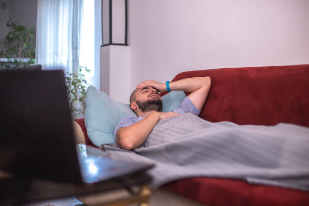 istock Sick male with cold / flue / covid-19 1348138996