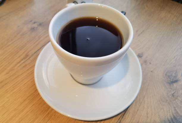 istock A cup of coffee in a white cup and saucer 1348139002