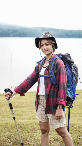 istock young Asian female prepare for hipster hiking 1348146257
