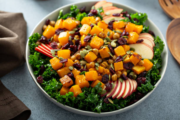 istock Fall salad with kale, roasted squash and apples 1348158761