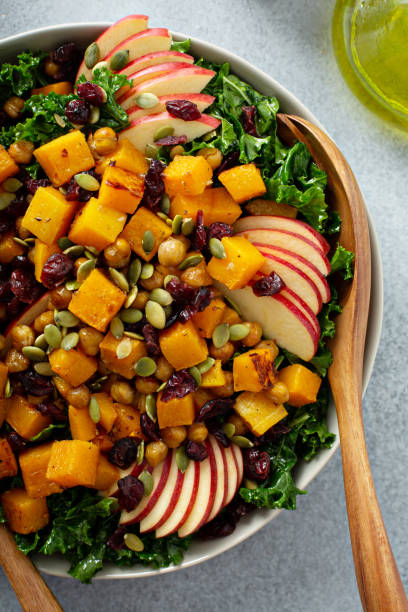 istock Fall salad with kale, roasted squash and apples 1348158816