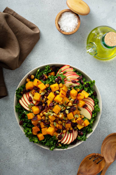 istock Fall salad with kale, roasted squash and apples 1348158831