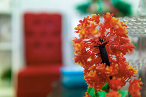 Synthetic flowers used as decorations in the living room make the atmosphere of the room more cheerful