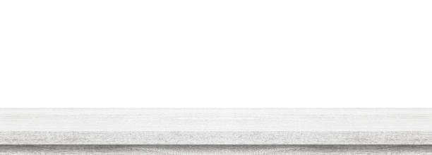 istock Wooden old white table top isolated on background 1348168498