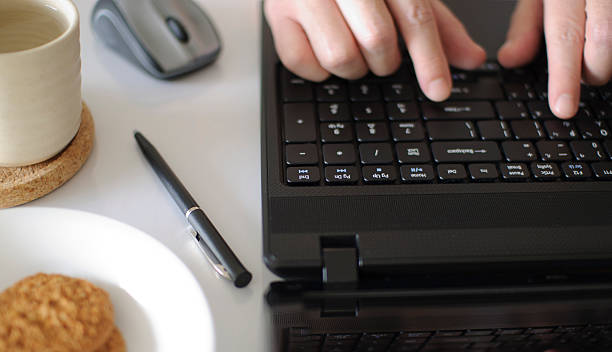 istock Close-up shot of hands typing 134817167