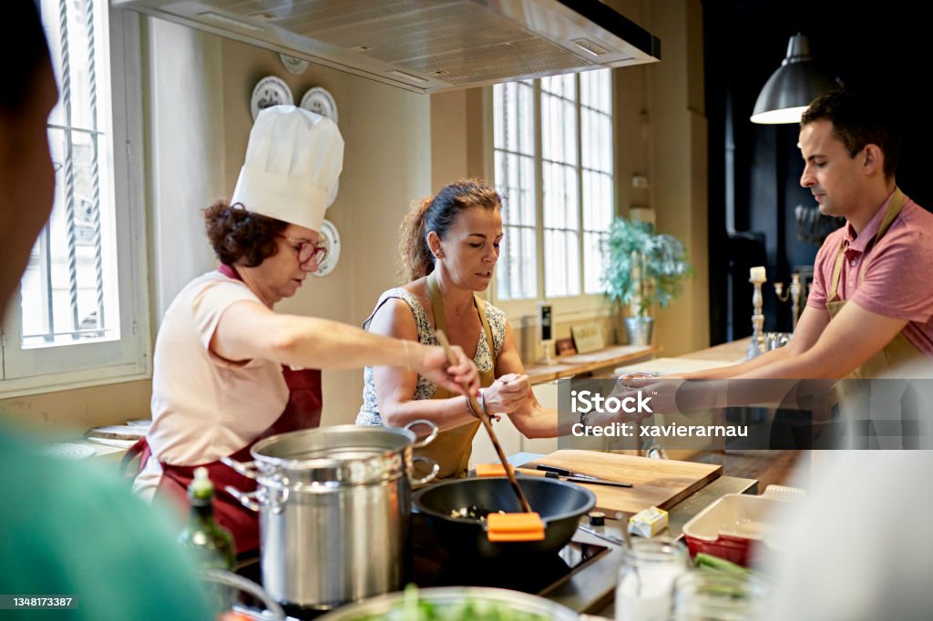 Cooking With Adult Adult Students Participating In Cooking Class Stock Photo - Download ...