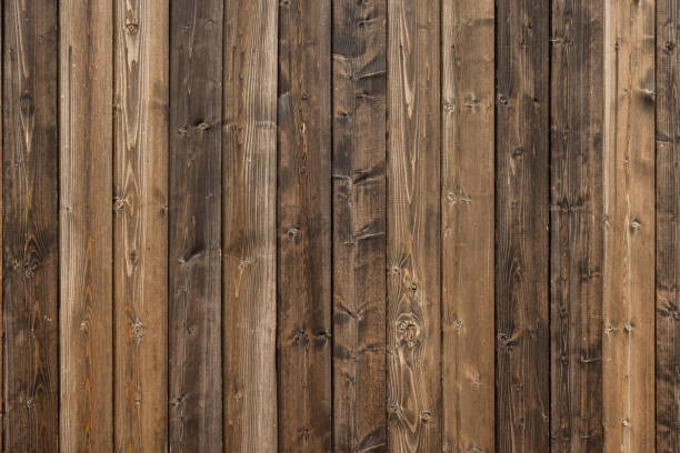 istock old dry weathered brownish gray wooden planks board surface - full frame background and texture 1348173388