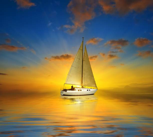istock sailing yacht in the rays of the setting sun 1348178296