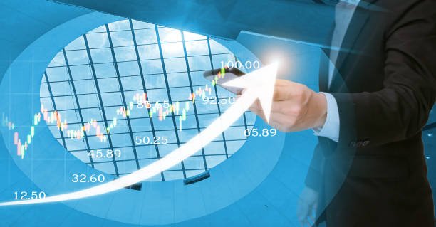 istock On a virtual interface goal chart, a businessman uses a tablet to analyze growth graph financial data and sales profit. As a result of intelligent technology, smart business solutions are developed. 1348184633