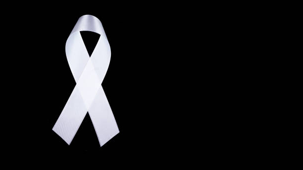 istock A white awareness ribbon on black background for peace condition 1348185026