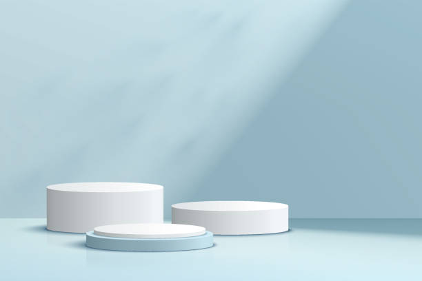 istock Abstract realistic 3D white and blue cylinder pedestal podium set with shadow and lighting. Pastel blue minimal scene for product display presentation. Vector geometric rendering platform. Studio room 1348187859