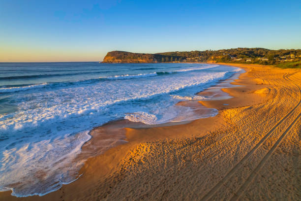 istock Surfs up aerial sunrise seascape 1348193968
